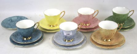 A set of six Royal Albert teacups, saucers and plates in the 'Gossamer' pattern.