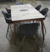 A contemporary garden table and set of six chairs.