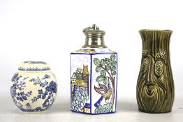 A group of three ceramic items.