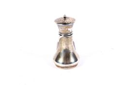 A silver pepper shaker. Maker Robert Chandler, Birmingham 1920, 34.5 grams, H8cm.