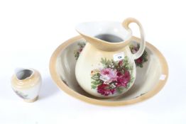 A Victorian three piece wash set. Including bowl, jug and vase.