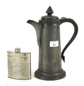 A hip flask and a pewter stein.