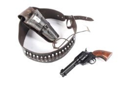 A denix model of a 45 Cowboy pistol with holster and dummy bullets