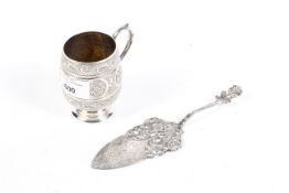 Continental white metal engraved cup and cake slice. Stamped 90, with pierced decoration, 160 grams.