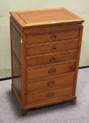 An oriential style chest of 6 graduated drawers for cutlury