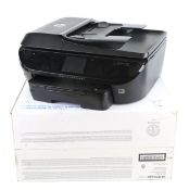 A boxed HP 'Envy' printer.