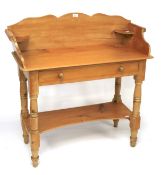 A 20th century pine wash stand.