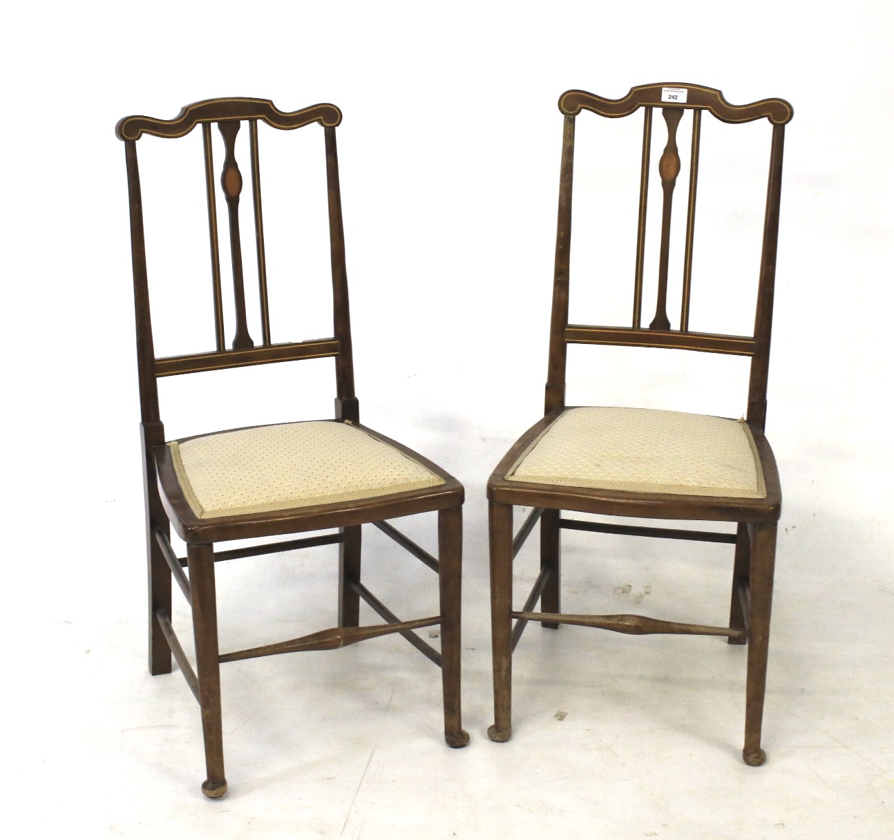 Pair of wooden chairs.