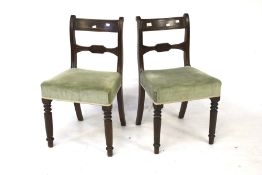 Two dining room chairs. Shield backed with turned legs, H81cm x D41cm x W44cm.