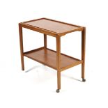 A mid-century teak drinks trolley.