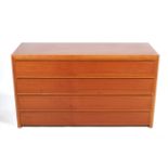 A contemporary wooden veneered chest of drawers,