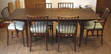 A 1960s Danish teak dining table and six chairs.