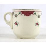 An LMS ceramic teacup.