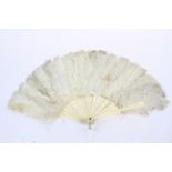 An early 20th century folding ostrich feather fan.