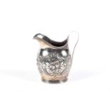 A George III silver milk jug.