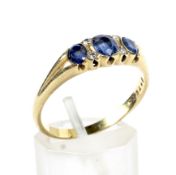 A vintage 18ct gold, sapphire and diamond dress ring.