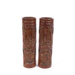 A pair of 20th century Chinese carved bamboo brushpots.