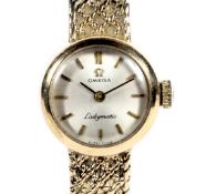 Omega, Ladymatic, a lady's 9ct gold round bracelet watch, circa 1966.