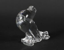 A 20th century Steuben glass model of a stylised dove. Etched mark to base, 17.