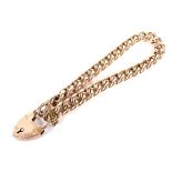 An early 20th century rose gold hollow-curb link bracelet.