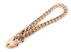 An early 20th century rose gold hollow-curb link bracelet.