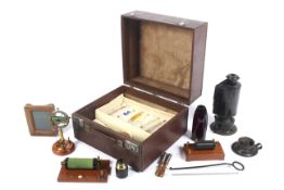 A group of scientific instruments in a case.