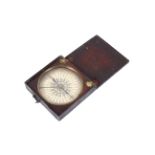 A 19th century mahogany cased travelling compass.