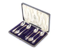 A set of six silver teaspoons and a pair of sugar nips, in a case.
