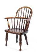 A hooped back elm seated child's chair.