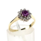 A vintage 18ct gold, ruby and diamond cluster ring.