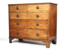 An early 19th century mahogany chest of drawers.