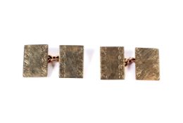 A pair of 9ct gold rectangular twin-panel and chain cufflinks.