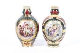 A pair of Vienna-style porcelain oviform vases, circa 1900.
