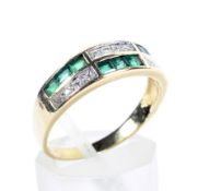 A vintage gold, emerald and diamond two-row dress ring.