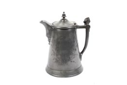 A large 19th century pewter flagon and hinged cover.
