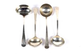 A set of three George III silver old English pattern sauce ladles with crests.