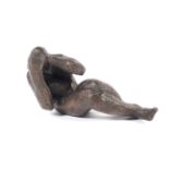 Attributed to Alan Thornhill (1921-2020), a bronze sculpture of a reclining figure.