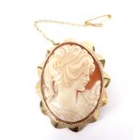 A vintage 9ct gold and shell cameo brooch.