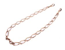 An early 20th century rose gold curb link necklace adapted from an 'Albert' or watch chain.