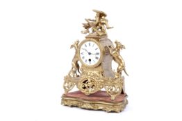 A Continental gilt metal mantle clock on a giltwood base, circa 1900.