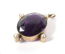 A Victorian rose gold, amethyst and half-pearl oval pendant.