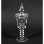 A Bohemian engraved glass goblet and cover in the 18th century style.