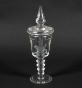 A Bohemian engraved glass goblet and cover in the 18th century style.