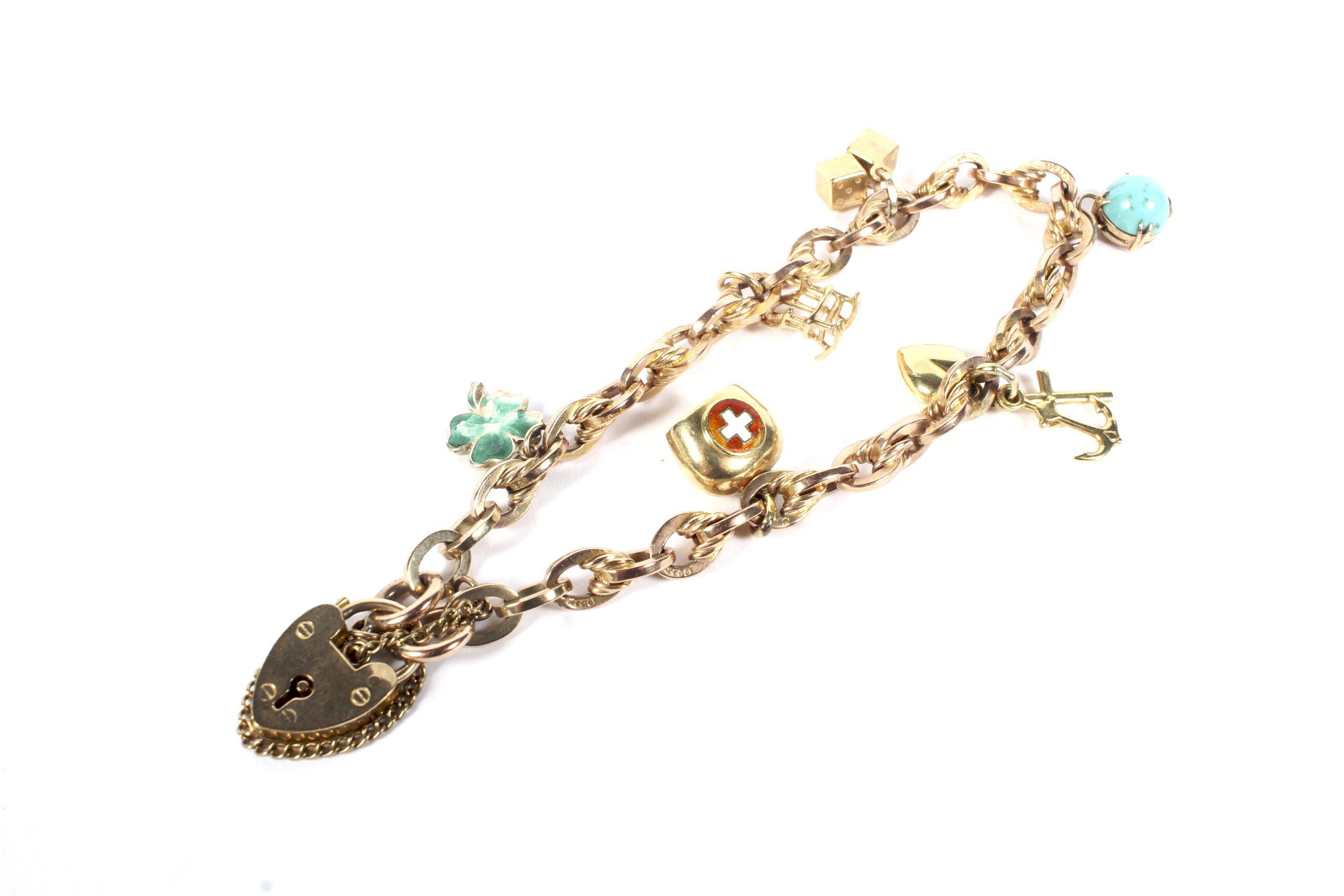 A vintage 9ct rose gold fancy anchor link 'charm' bracelet.