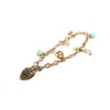 A vintage 9ct rose gold fancy anchor link 'charm' bracelet.