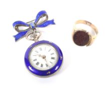 An early 20th century Continental white metal and enamel keyless fob watch and a gold signet ring.
