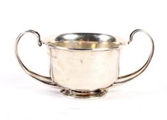 An Arts and Crafts silver two-handled bowl.