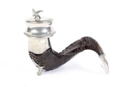 A pewter-mounted ram's horn snuff mull.