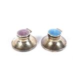 Two silver capstan-shaped and guilloche enamelled inkwells.