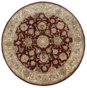 A 20th century circular Persian style rug.